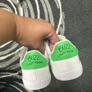 Adidas buzz light year sneakers